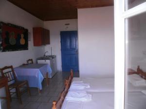 A bed or beds in a room at Climati Studios