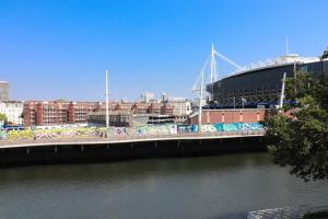 a view of a baseball stadium and a river at Principality View Apartment Three, by Solace Stays in Cardiff
