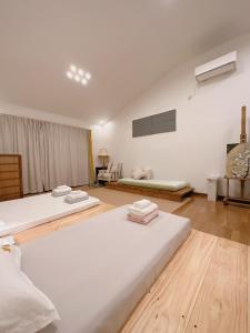 Ένα ή περισσότερα κρεβάτια σε δωμάτιο στο 三米-鶴舞琵琶湖-biwako