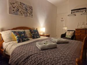 Ein Bett oder Betten in einem Zimmer der Unterkunft Cable Island Bed and Breakfast