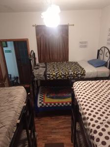 Letto o letti in una camera di Don Pablo