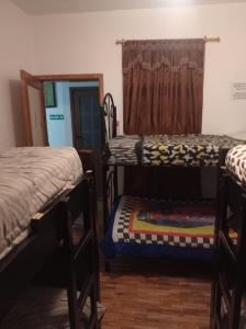 Letto o letti in una camera di Don Pablo