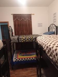 Letto o letti in una camera di Don Pablo