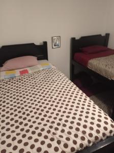 Letto o letti in una camera di Don Pablo