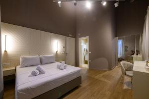 Ένα ή περισσότερα κρεβάτια σε δωμάτιο στο BlueBlood - The Rooms