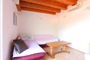 Posteľ alebo postele v izbe v ubytovaní Apartment Brela 789a
