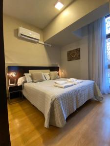 Katil atau katil-katil dalam bilik di Andino Apartaments Rental Capital