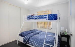 Una cama o camas en una habitación de Moet Escape in Style