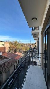 a balcony with a view of a building at Hermoso y amplio departamento in Tarija