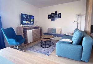 A television and/or entertainment centre at Studio Apartment at outskirt of High Tatras