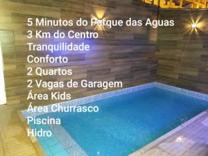 un panneau décrivant les noms d'une piscine dans l'établissement Cantinho do Rafa, à São Lourenço