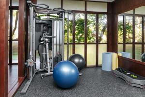 a gym with a fitness ball and a exercise ball at Zeavola Resort in Phi Phi Islands