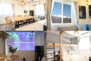 a bedroom and a living room with a view of a mountain at 2023年新築 個室サウナ 浅間山絶景 軽井沢アウトレット圏内 VillaHanasaku 軽井沢御代田 Hoshi棟 in Miyota