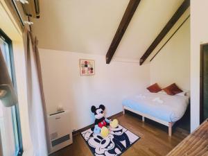 Voodi või voodid majutusasutuse Pixel Chalet.象宿.Hakuba Echoland白马滑雪避暑别墅 toas