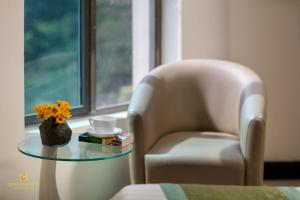 Posezení v ubytování Quang Chung Hotel Le Van Thiem