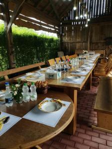 a long table set up for a meal in a restaurant at Dridif 135 in Dridif