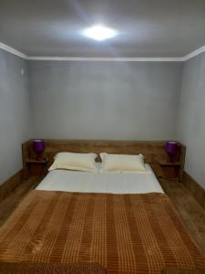 Postel nebo postele na pokoji v ubytování Tskaltubo Guest House On Mirian Mepe