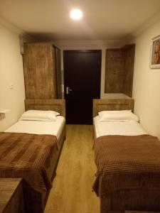 Postel nebo postele na pokoji v ubytování Tskaltubo Guest House On Mirian Mepe