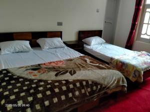 Postel nebo postele na pokoji v ubytování Stream View Guest House