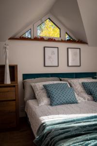 Postel nebo postele na pokoji v ubytování Domek na Szlaku