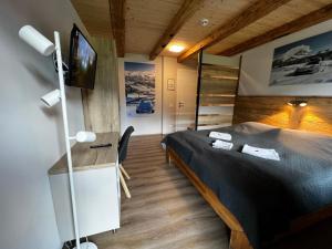 Posteľ alebo postele v izbe v ubytovaní Hotel Landhaus Lungau