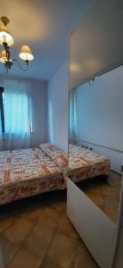 Ένα ή περισσότερα κρεβάτια σε δωμάτιο στο Casa Mia Sirolo