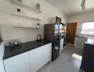 The Urban Hub in Block 5 tesisinde mutfak veya mini mutfak