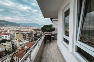 a balcony with a view of a city at "Kale Street" Alanya in Alanya