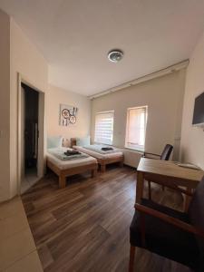 Postel nebo postele na pokoji v ubytování Apart Pension Plaue