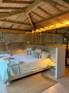 Cama ou camas em um quarto em Villa Margaridi
