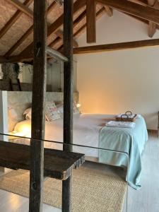 Cama ou camas em um quarto em Villa Margaridi