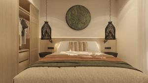 a bedroom with a bed and two mirrors on the wall at Opal Paros in Naousa