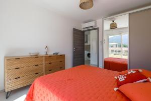 Postel nebo postele na pokoji v ubytování Amandula - Appt climatisé vue mer