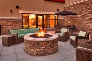 a fire pit in the middle of a patio at Residence Inn Salt Lake City Murray in Murray