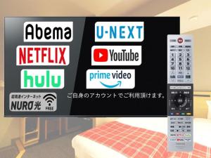 Télévision ou salle de divertissement dans l'établissement Hotel La Foresta By Rigna