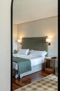 Un ou plusieurs lits dans un hébergement de l'établissement Parador de Ronda