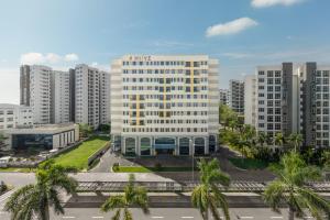 an aerial view of a building in a city at HIIVE by Fusion Binh Duong in Thuan An