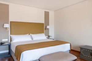 Un ou plusieurs lits dans un hébergement de l'établissement Parador de Ronda