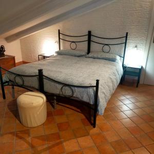 Mansarda Viti - View on the pediment - tesisinde bir odada yatak veya yataklar