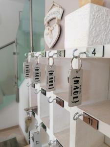 a bunch of locks on a shelf in a room at Hotel Raul in Riccione