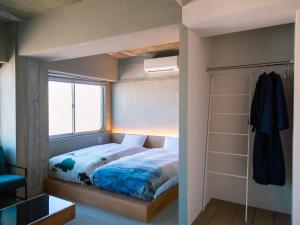 Postel nebo postele na pokoji v ubytování Kagan Hotel & Hostel + 37 fotografií