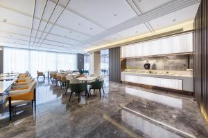 Restoranas ar kita vieta pavalgyti apgyvendinimo įstaigoje Atour Hotel Suqian West Lake Road Golden Eagle Plaza