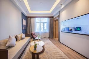 TV a/nebo společenská místnost v ubytování Atour X Hotel Shenyang Beiling Park