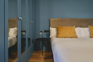 Posteľ alebo postele v izbe v ubytovaní Arenas Atiram Hotel