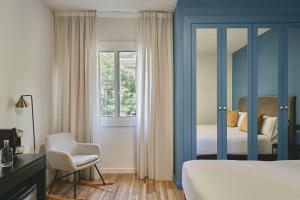 Posteľ alebo postele v izbe v ubytovaní Arenas Atiram Hotel