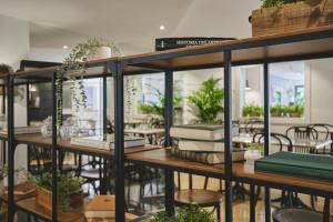 Reštaurácia alebo iné gastronomické zariadenie v ubytovaní Arenas Atiram Hotel