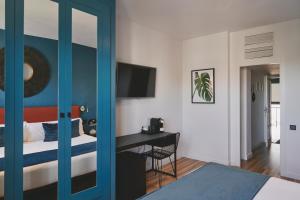Posteľ alebo postele v izbe v ubytovaní Arenas Atiram Hotel
