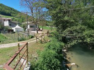 a view of a river from a bridge at Residenza Il Conte in Nocera Umbra