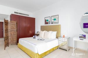 Postel nebo postele na pokoji v ubytování Dream Inn Apartments - Rimal JBR