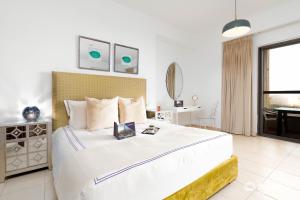 Postel nebo postele na pokoji v ubytování Dream Inn Apartments - Rimal JBR